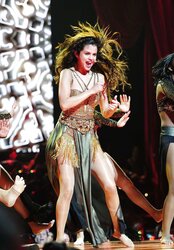 Selena Gomez performing in Stockings