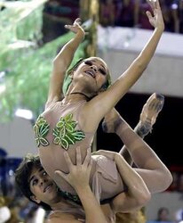 Samba dancers unwrap