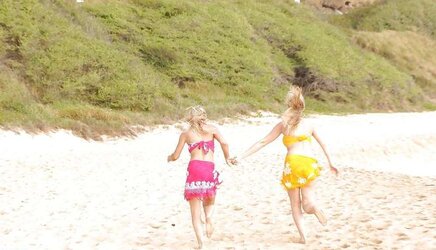 2 molten blondes on a beach