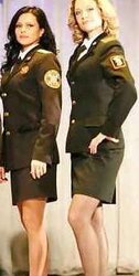 Femmes in uniforms wearing nylons..