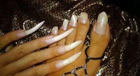 White ladies with lengthy ravages and lengthy toenails Part
