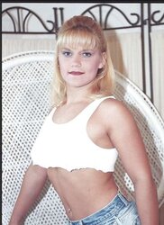 Ash-Blonde with fat nips and smallish bra-stuffers posing