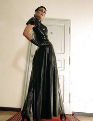 Steaming fetish dominatrix with some petplay