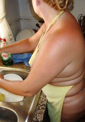 A wonderful mature dame in the kitchen