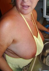 A wonderful mature dame in the kitchen
