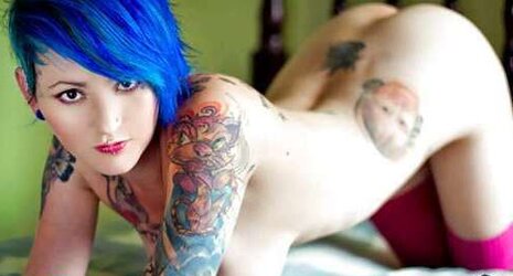 Remarkable damsels with tattooes, Tattooed Caboose