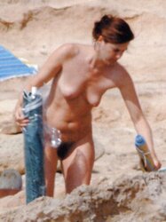 Sveva Sagramola (italian journalist) bare on the beach