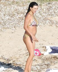 Penelope Cruz Caught Braless on Beach Vacation