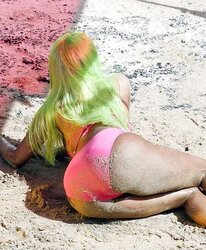 Nicki Minaj wears a pinkish bikin