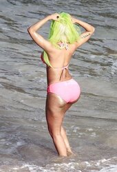 Nicki Minaj wears a pinkish bikin