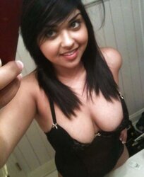 Big-Chested Stunner takes some selfshots