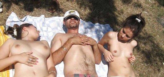 Real nudists sunbathing bare