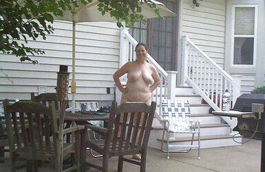 Mature naturist duo nude outside in public