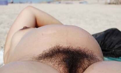 Pregnant, fur covered wifey on naked beach