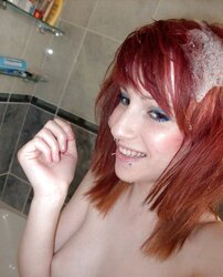 Crimson haired UK babe