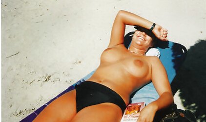 Teenager with phat bra-stuffers on the beach