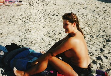 Teenager with phat bra-stuffers on the beach