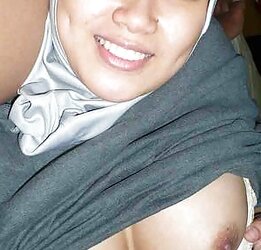 Scorching funbags of indonesian jilbab hijab tudung