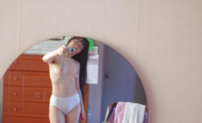 Mature Korean with unshaved armpits selfshot naked