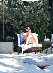Kate Moss Sunbathes Stripped To The Waist on Vacation in Jamaica