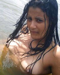 Naked indian stunner swimming