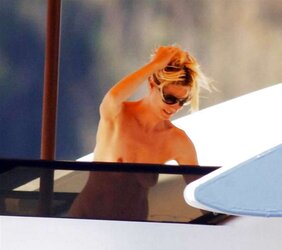 Heidi Klum Fresh Stripped To The Waist Sunbathing on a Yacht