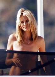 Heidi Klum Fresh Stripped To The Waist Sunbathing on a Yacht
