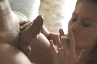 Stacey smoking while deep throating man meat