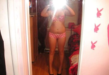 Teenager posing on the mirror