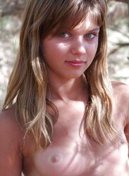 Nude ultra-cute teenager at the woods