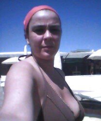 Buxomy italian female on beach
