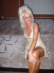 Inexperienced ash-blonde granny in pantyhose opening up